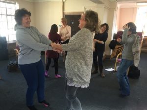 20160304 03 Double Handshake - Corporate Laughter Yoga Training & Workshop Specialists in the UK | Corporate Wellness & Workplace Wellbeing Programmes, Trainings & Workshops in London UK with Laughter Yoga Expert Lotte Mikkelsen