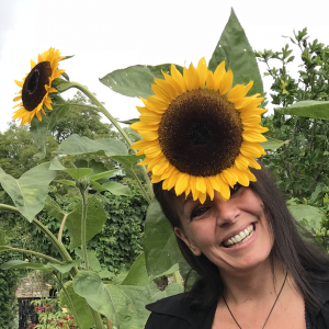 Small Pic Lotte Mikkelsen and Sunflower - Corporate Laughter Yoga Training & Workshop Specialists in the UK | Corporate Wellness & Workplace Wellbeing Programmes, Trainings & Workshops in London UK with Laughter Yoga Expert Lotte Mikkelsen