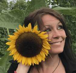 Small Pic Lotte Mikkelsen and Sunflower 2 e1593764186959 - Corporate Laughter Yoga Training & Workshop Specialists in the UK | Corporate Wellness & Workplace Wellbeing Programmes, Trainings & Workshops in London UK with Laughter Yoga Expert Lotte Mikkelsen