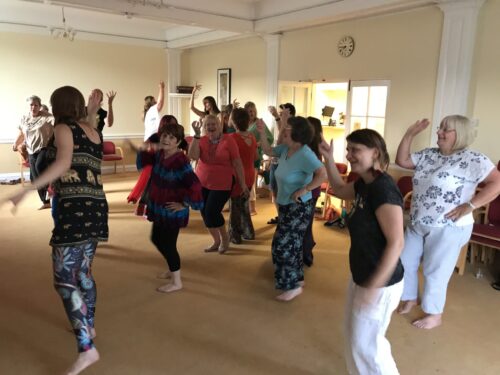 2019 07 12 Bollywood Moves scaled e1640877869844 - Corporate Laughter Yoga Training & Workshop Specialists in the UK | Corporate Wellness & Workplace Wellbeing Programmes, Trainings & Workshops in London UK with Laughter Yoga Expert Lotte Mikkelsen