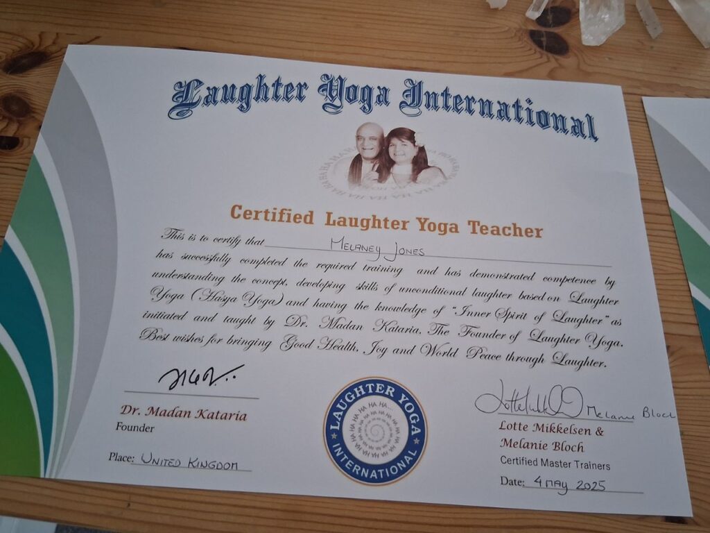 Laughter Yoga Certificate Mel News Image - Corporate Laughter Yoga Training & Workshop Specialists in the UK | Corporate Wellness & Workplace Wellbeing Programmes, Trainings & Workshops in London UK with Laughter Yoga Expert Lotte Mikkelsen